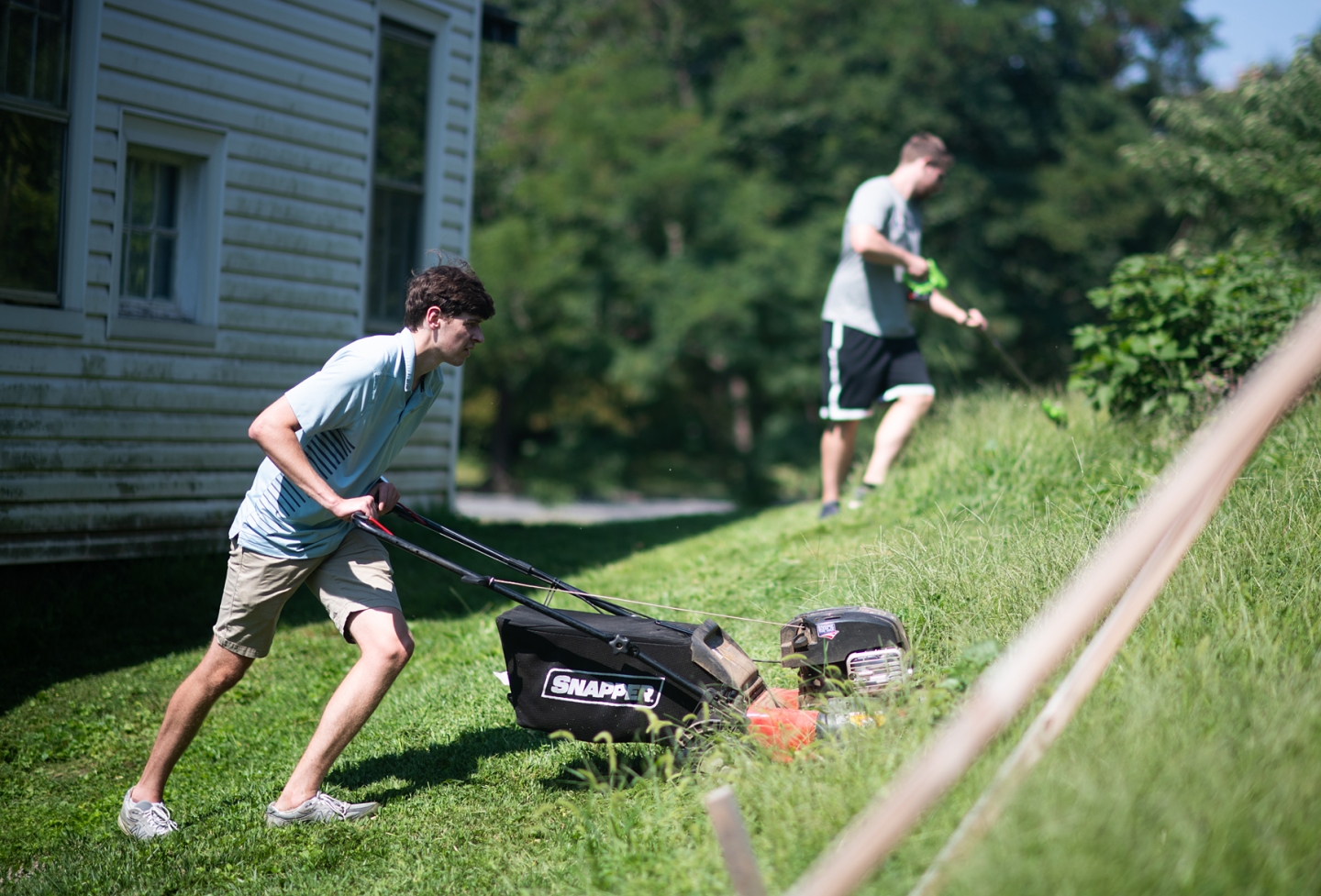 Students doing yardwork