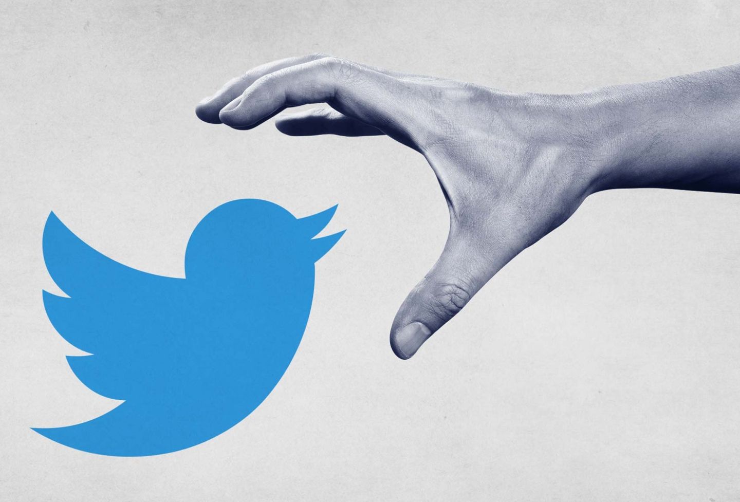 Hand grabbing Twitter logo